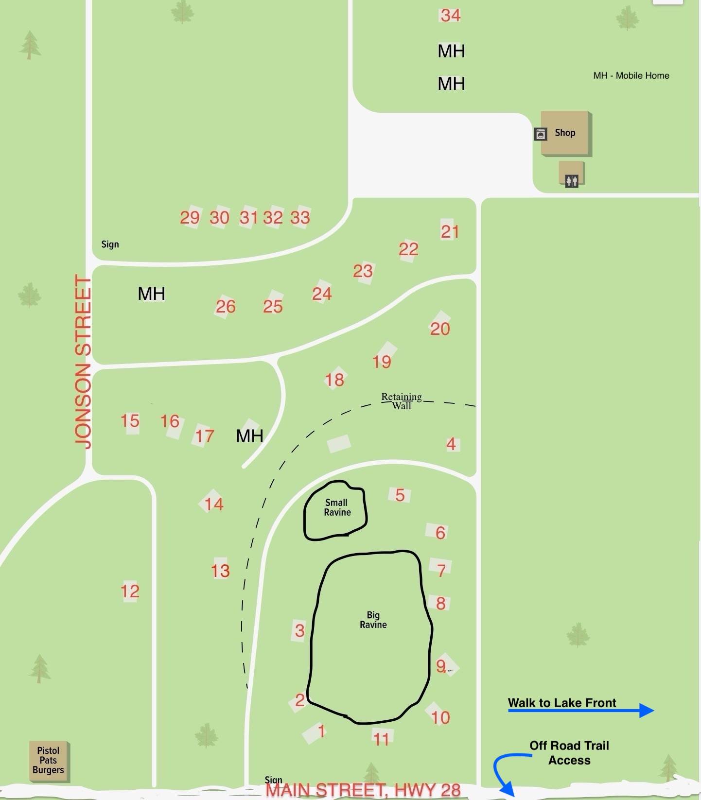 Map of a campground showing numbered lots, mobile home areas, a shop, two ravines, a reception point, trails, and roads including Main Street/Hwy 28 and Jonson Street.